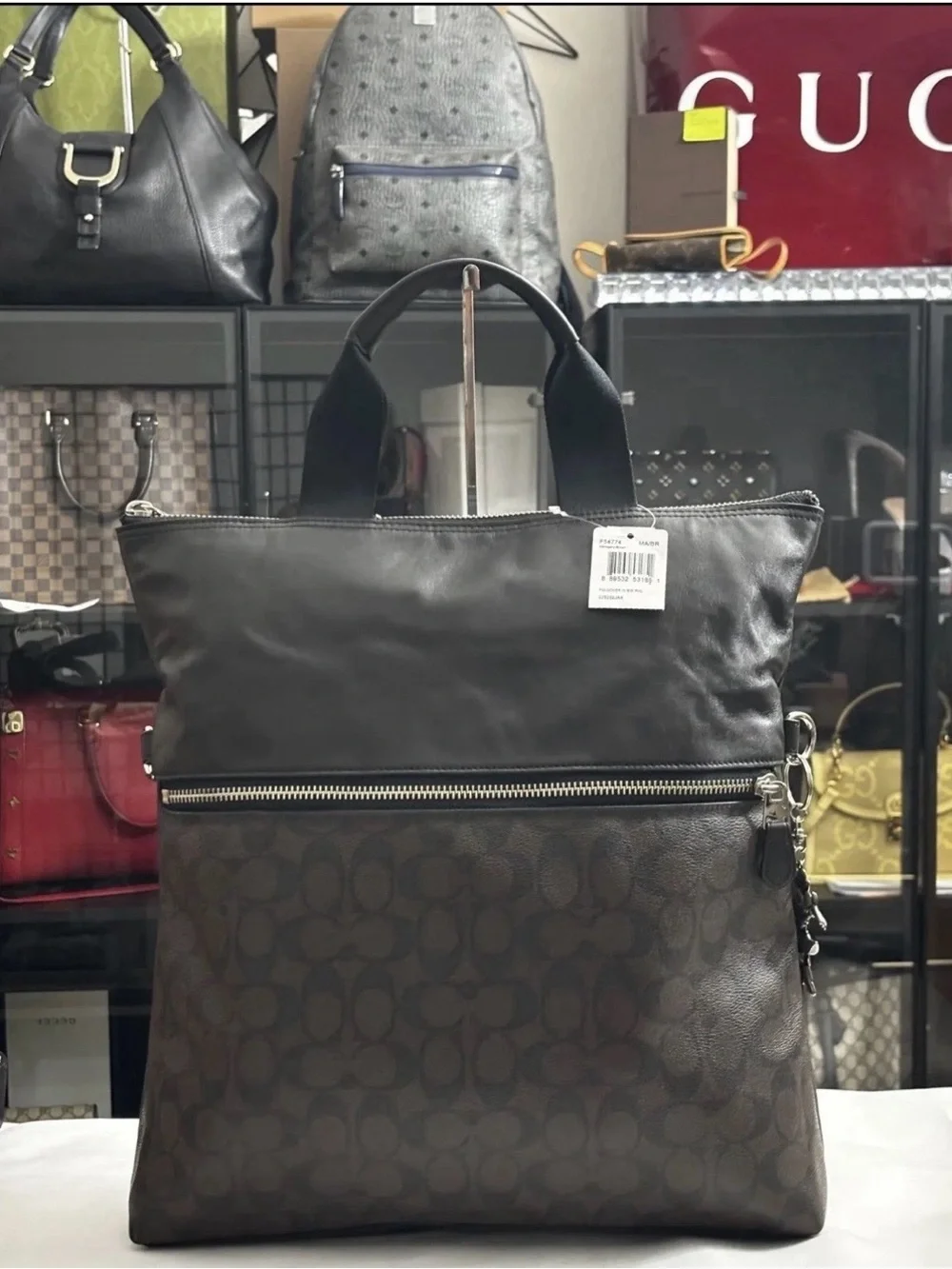 Coach Unisex Charles Chocolate Brown Signature C Fold Over Classic Work Bag.